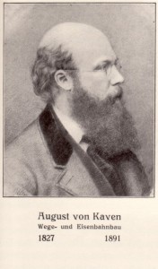 Porträt von August von Kaven. Ein kahlköpfiger Mann mit Vollbart und Brille im Profil, blickt nach rechts