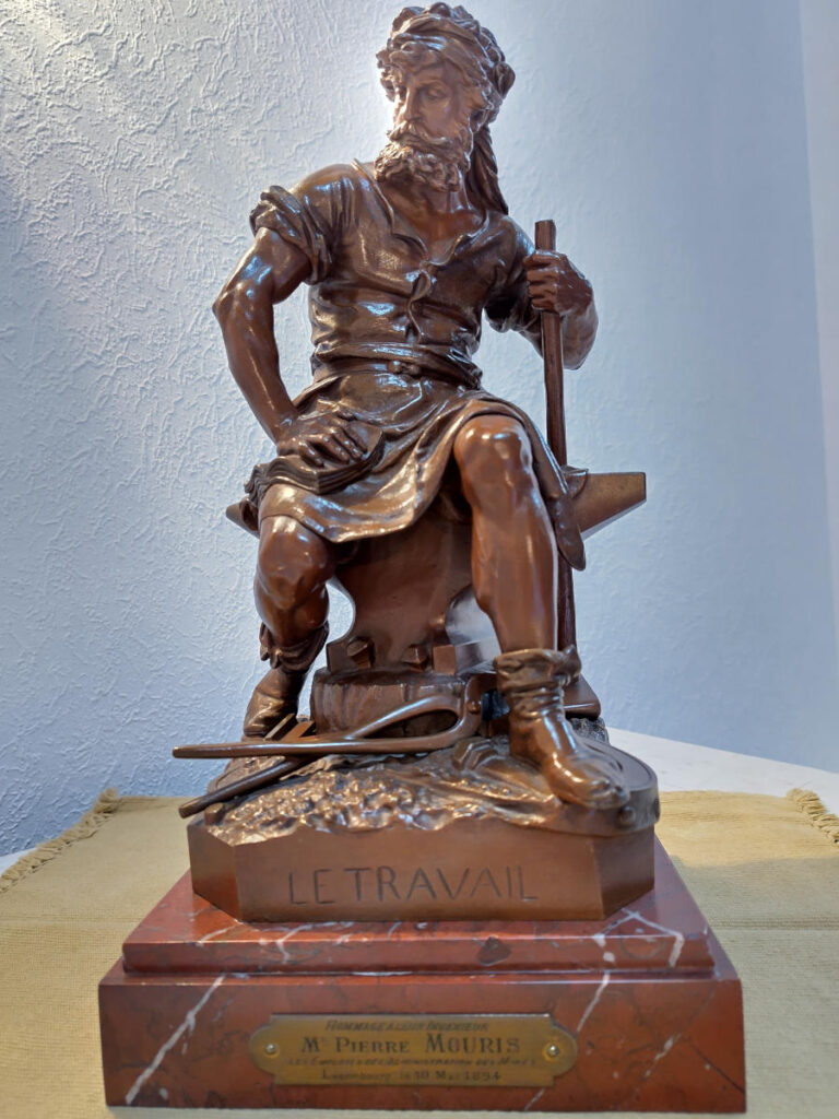 Bronzefiguer "Le Travail"